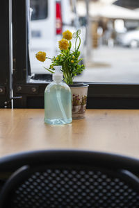 Close-up of flower vase on table