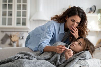 Mother and daughter at home