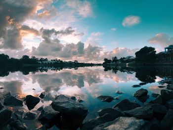 Scenic view of lake against sky during sunset