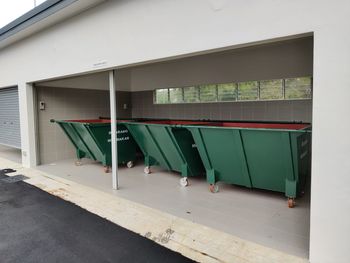 Empty chairs and tables in building