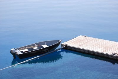 High angle view of ship moored on sea against sky