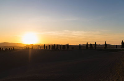 Scenic view of silhouette landscape against sky during sunset