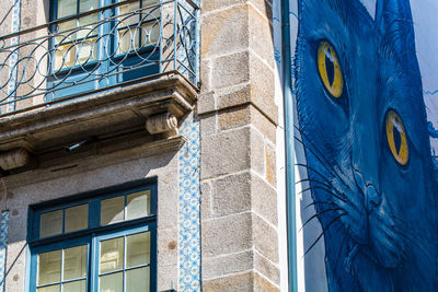 Low angle view of graffiti on building wall