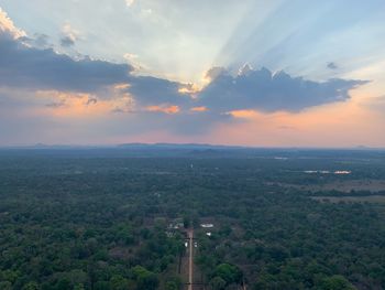 Scenic view of landscape against sky during sunset