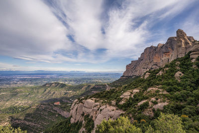 Scenic view of rocky mountains against sky