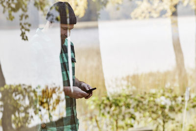 A man looking at his mobile phone