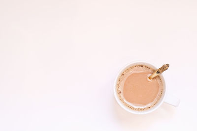 High angle view of coffee cup on table