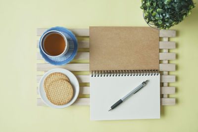 High angle view of coffee cup on table