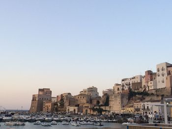 View of cityscape against clear sky