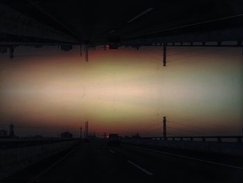 Empty road at sunset