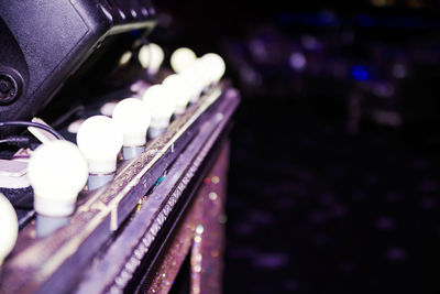 Close-up of illuminated lighting equipment