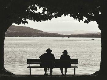 People relaxing in lake