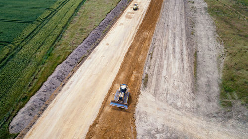 Aerial view of bulldozer on dirt road