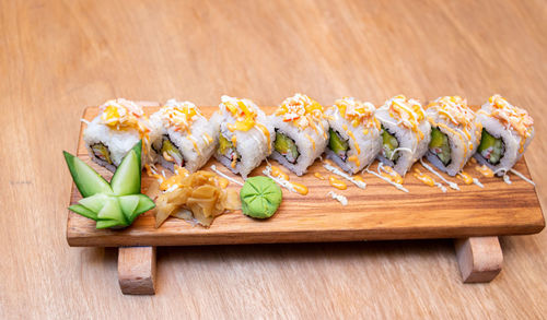 High angle view of sushi on cutting board