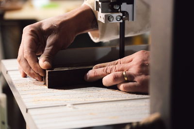 Close-up of man working on table