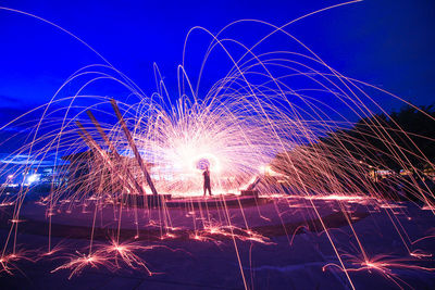 Firework display at night