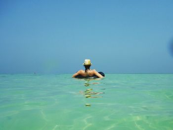 Scenic view of sea against clear sky