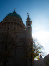 Low angle view of church against blue sky