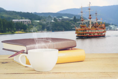 Close-up of coffee cup on table
