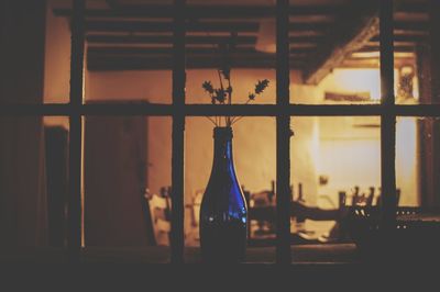 Close-up of silhouette bottles