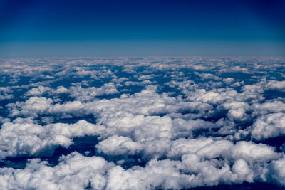 Aerial view of cloudscape against blue sky