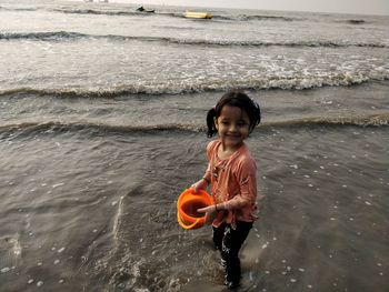 Portrait of smiling girl on beach