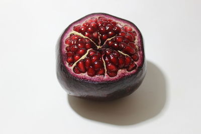 Close-up of strawberry cake against white background