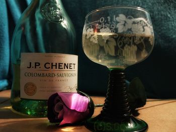 Close-up of wine glass on table