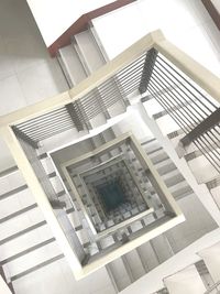 Low angle view of spiral staircase in building