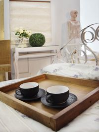 Close-up of coffee cup on table at home