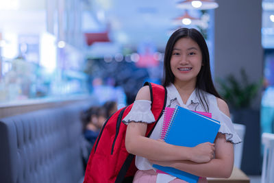 Portrait of a smiling young woman