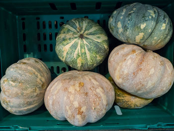 High angle view of pumpkins for sale in market