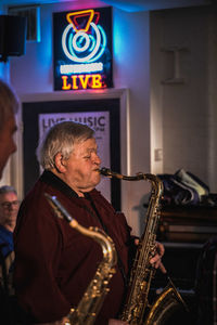 Man playing at music concert