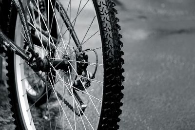 Cropped image of bicycle on road