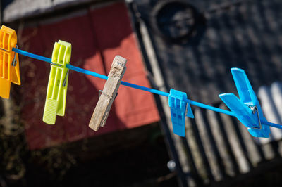 Close-up of clothes drying on rope