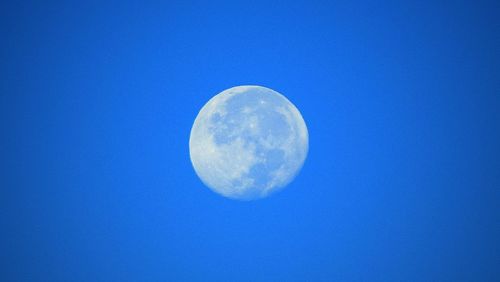 Low angle view of moon in sky