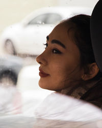 Close-up of young man looking away
