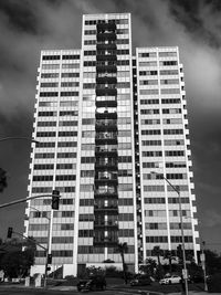 Low angle view of modern buildings in city against sky