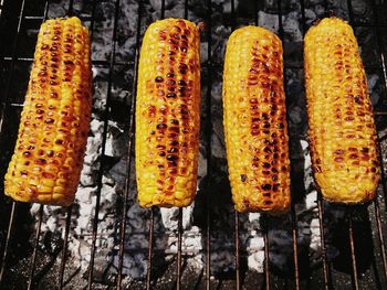 High angle view of meat on barbecue