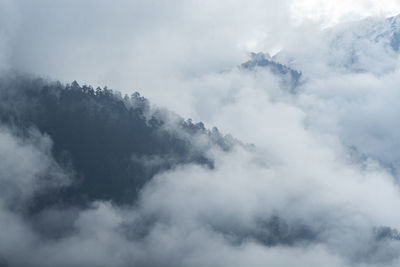 Mountains peaks in mist in north sikkim, india