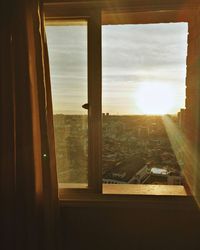 View of cityscape through window