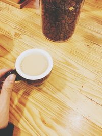 High angle view of coffee cup on table