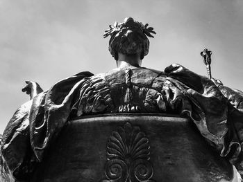 Low angle view of statue against sky