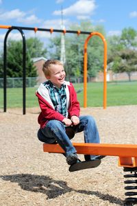 Boy playing at playground