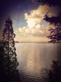 Scenic view of sea against cloudy sky