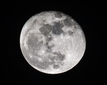 Scenic view of moon against sky at night