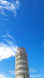 Low angle view of building against blue sky