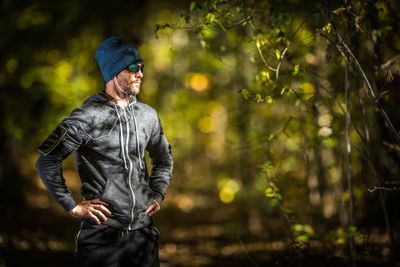 Man standing in forest