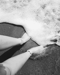 Low section of woman on beach