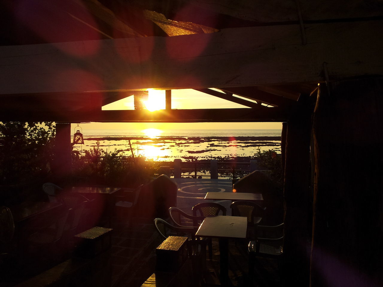 VIEW OF SUNSET THROUGH BOAT